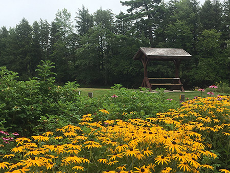 Stewiacke River Park entrance shelter and flowers
